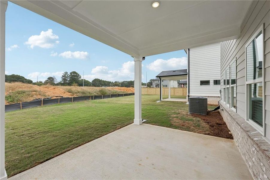 Exterior details and patio area of a home in Westmont Preserve, Powder Springs (Image 4).