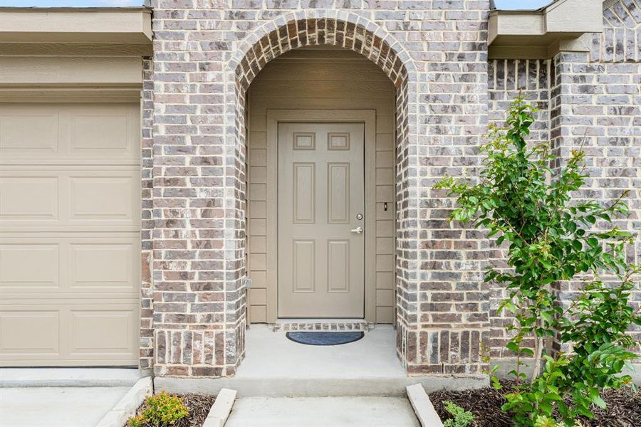 Front exterior of a new home in Heartland Elements, Crandall, TX, highlighting curb appeal (Image 1). Front exterior of a new home in Heartland Elements, Crandall, TX, highlighting curb appeal (Image 1).