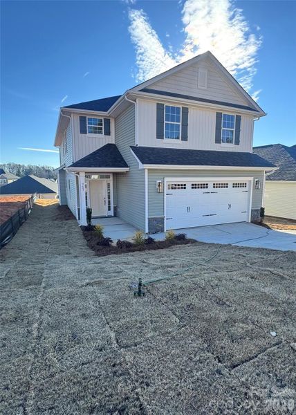 Front exterior of a new home in Village at Parkside, Gastonia, NC, highlighting curb appeal (Image 11).