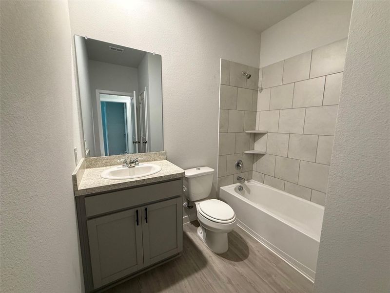 Furnished interior view inside a new home in Barrett Crossing, Crosby (Image 10).