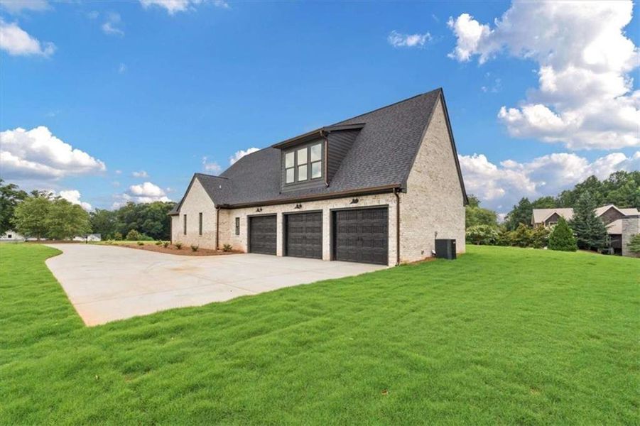 Front exterior of a new home in , Carrollton, GA, highlighting curb appeal (Image 34).