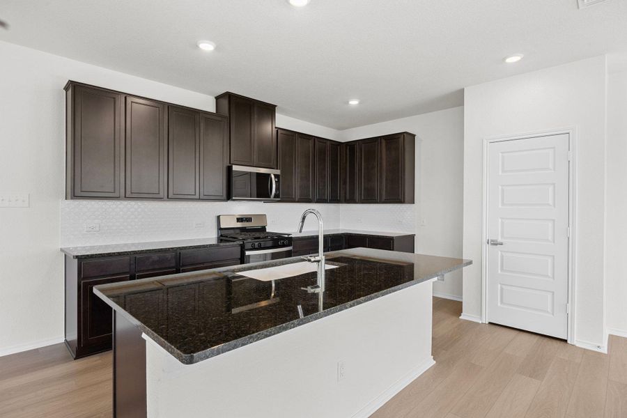 Furnished interior view inside a new home in Salerno - Heritage Collection, Round Rock (Image 9). Furnished interior view inside a new home in Salerno - Heritage Collection, Round Rock (Image 9).