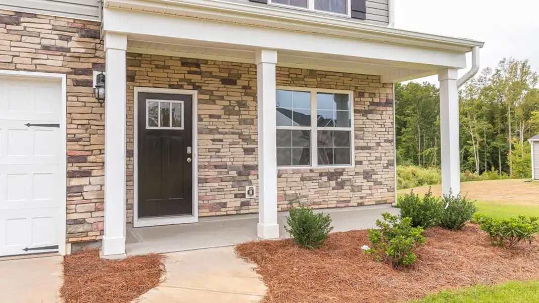 Exterior details and patio area of a home in The Landing at Summerhaven, Mebane (Image 2). Exterior details and patio area of a home in The Landing at Summerhaven, Mebane (Image 2).