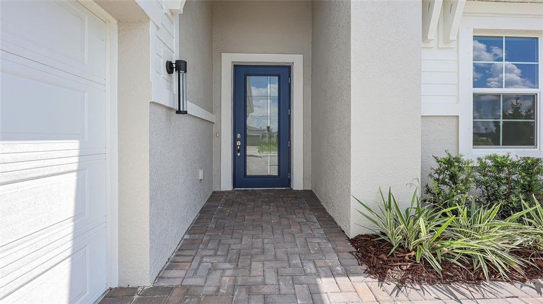 Exterior details and patio area of a home in Woodland Preserve, Parrish (Image 22).