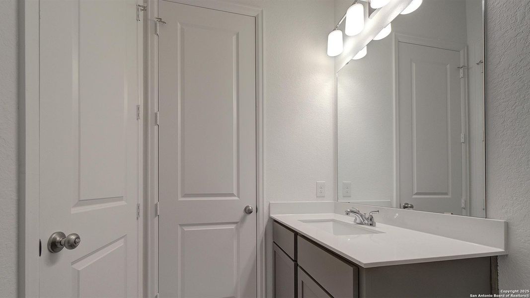 Furnished interior view inside a new home in Alsatian Oaks 50', Castroville (Image 23).