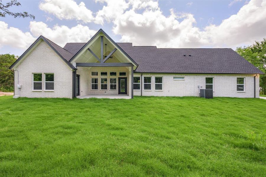 Front exterior of a new home in , Terrell, TX, highlighting curb appeal (Image 22).