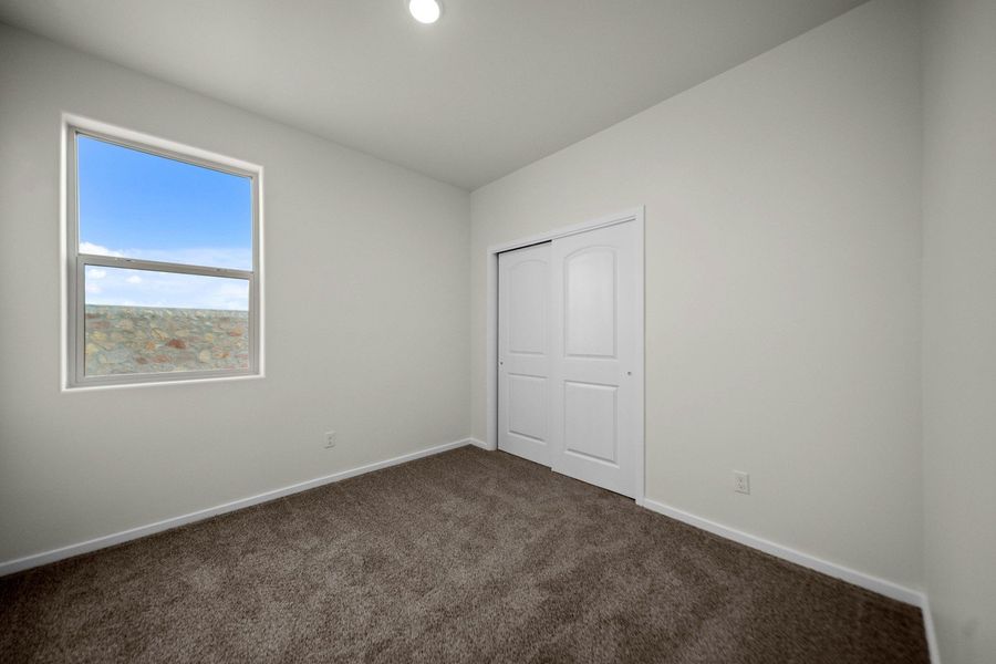 Representative unfurnished interior of a home built from the Aguirre by Hakes Brothers in Summer Sky North, El Paso (Image 19).