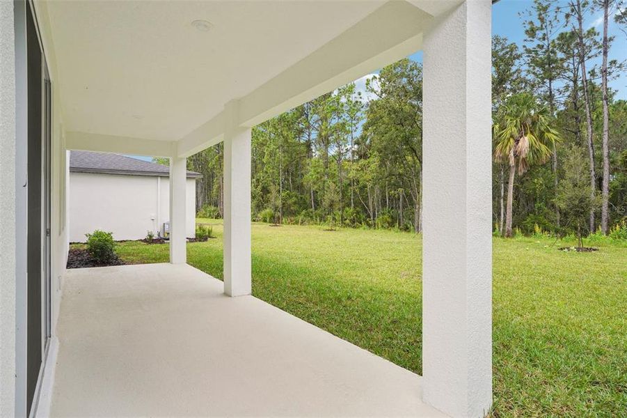 Exterior details and patio area of a home in , Ormond Beach (Image 26).