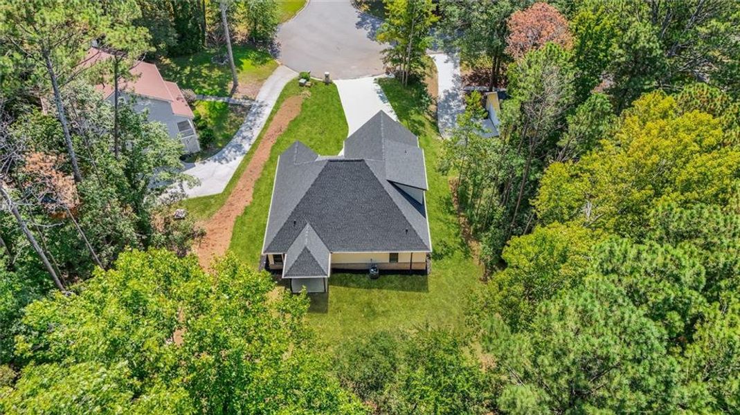 Front exterior of a new home in , Snellville, GA, highlighting curb appeal (Image 24).