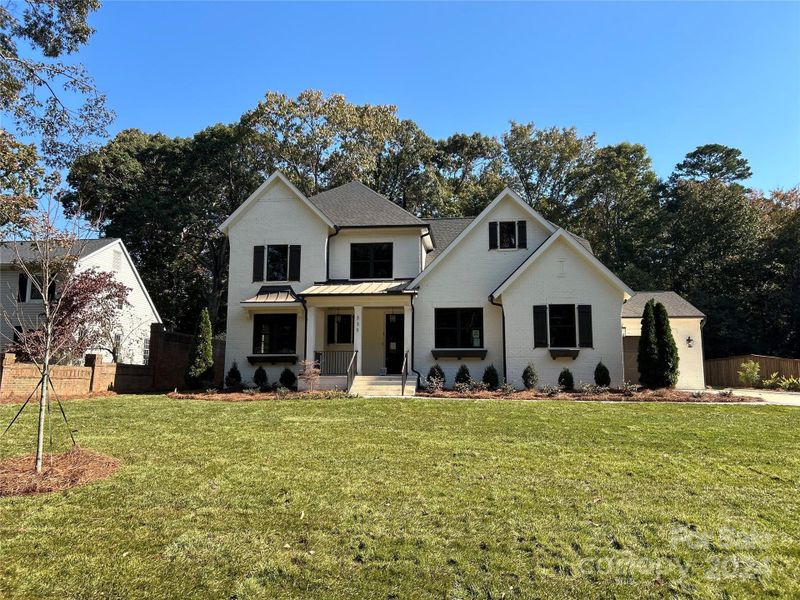 Beautiful painted brick exterior with bronze windows!