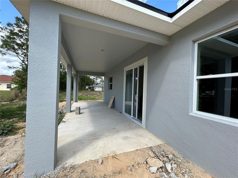 Exterior details and patio area of a home in , Sebring (Image 3).