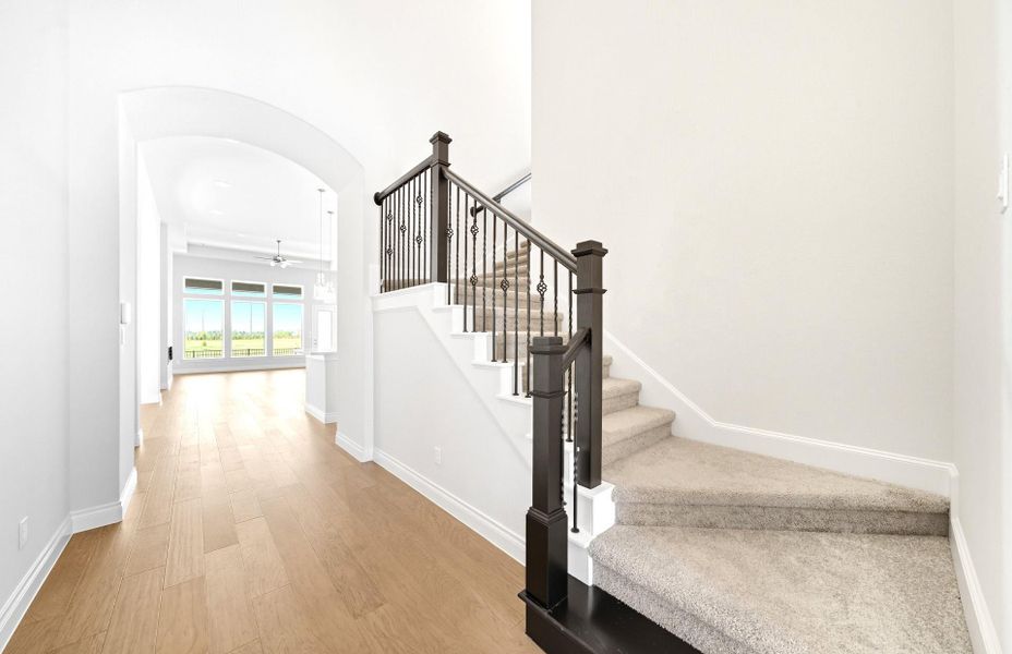 Furnished interior view inside a new home in Bridgeland 60′, Cypress (Image 5).