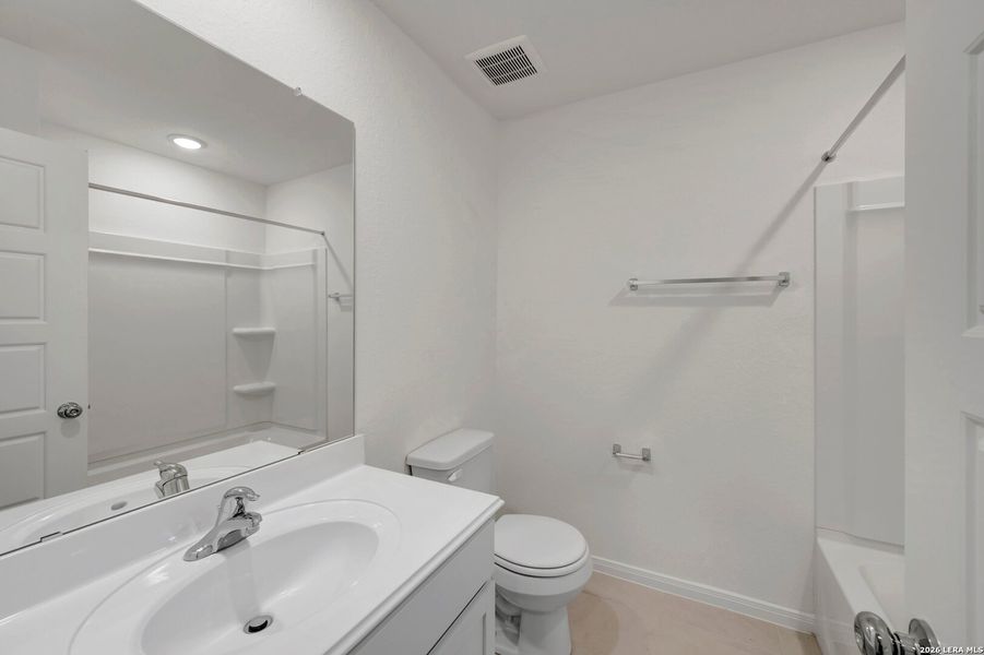 Furnished interior view inside a new home in Greenspoint Heights, Seguin (Image 4).
