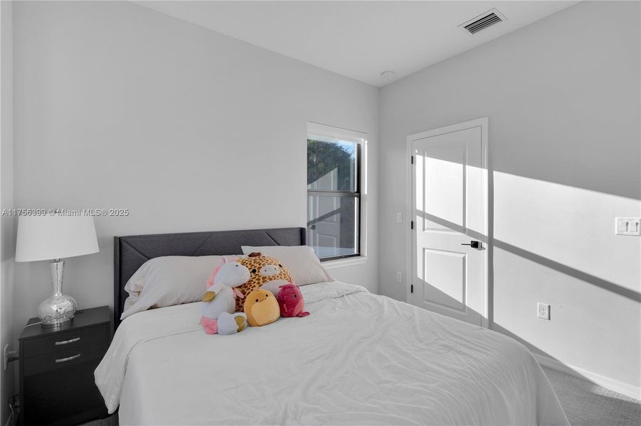 Furnished interior view inside a new home in , Tamarac (Image 24).