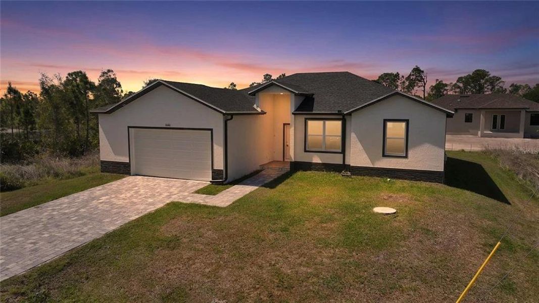 Front exterior of a new home in , Port Charlotte, FL, highlighting curb appeal (Image 28).