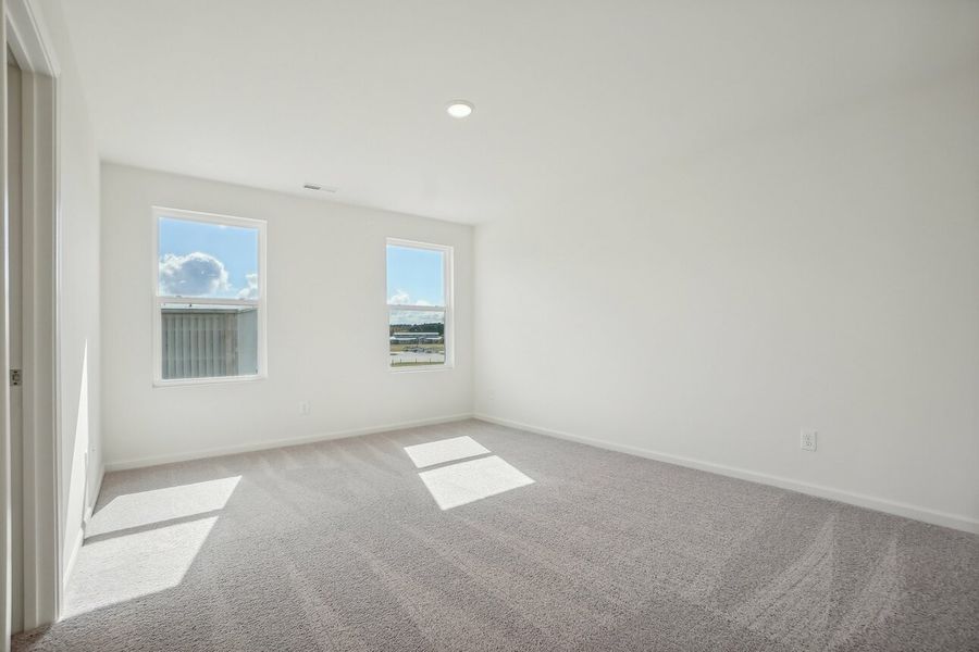 Representative unfurnished interior of a home built from the Dahlia by Starlight Homes in Walker Station, Wilson (Image 23).