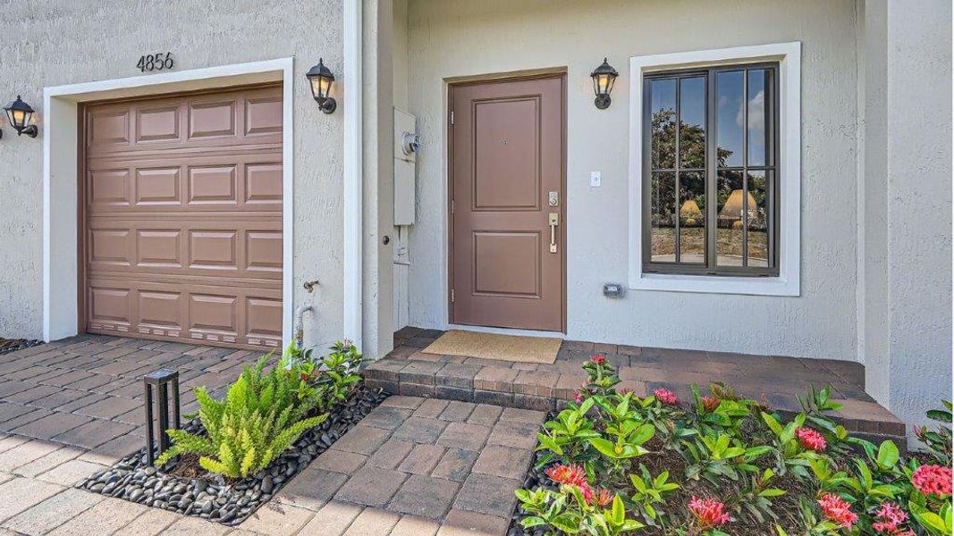 Representative exterior details of a home built from the Opal by D.R. Horton in Ashwood Cove, Lake Worth (Image 2). Representative exterior details of a home built from the Opal by D.R. Horton in Ashwood Cove, Lake Worth (Image 2).