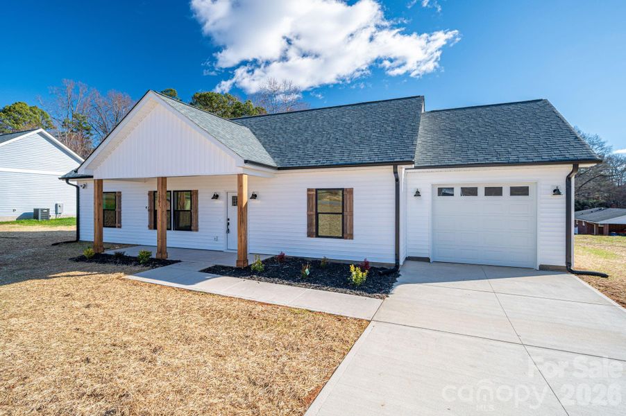 Front exterior of a new home in , Hickory, NC, highlighting curb appeal (Image 18).