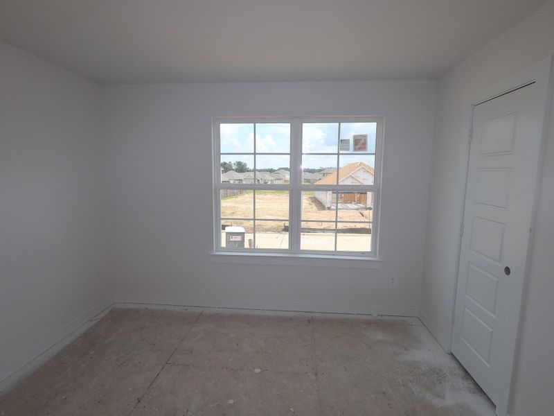 Spacious, unfurnished interior of a new home in Pinewood at Grand Texas, New Caney (Image 24).