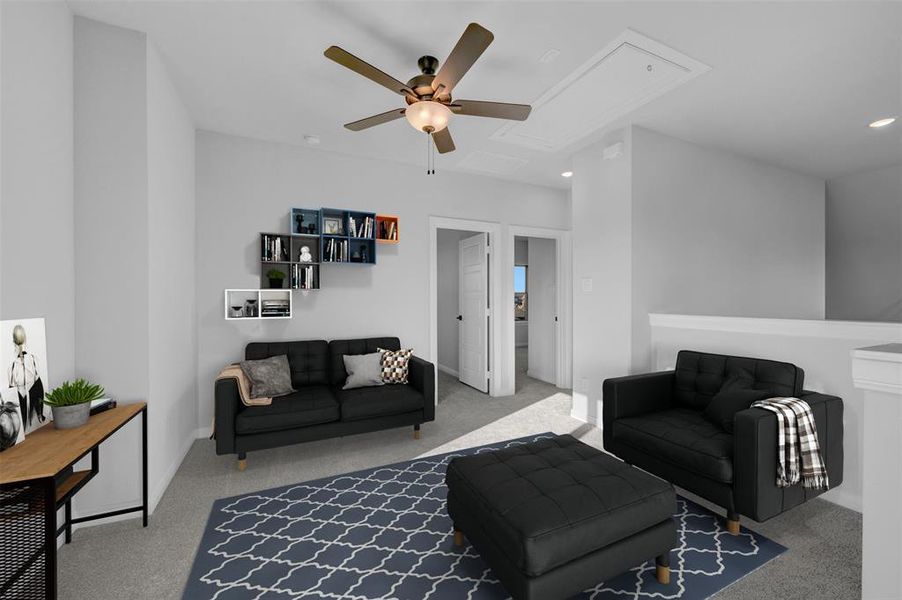 Living area featuring a ceiling fan and recessed lighting Living area featuring a ceiling fan and recessed lighting