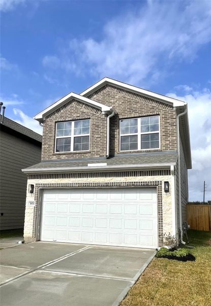 Front exterior of a new home in , Missouri City, TX, highlighting curb appeal (Image 26).