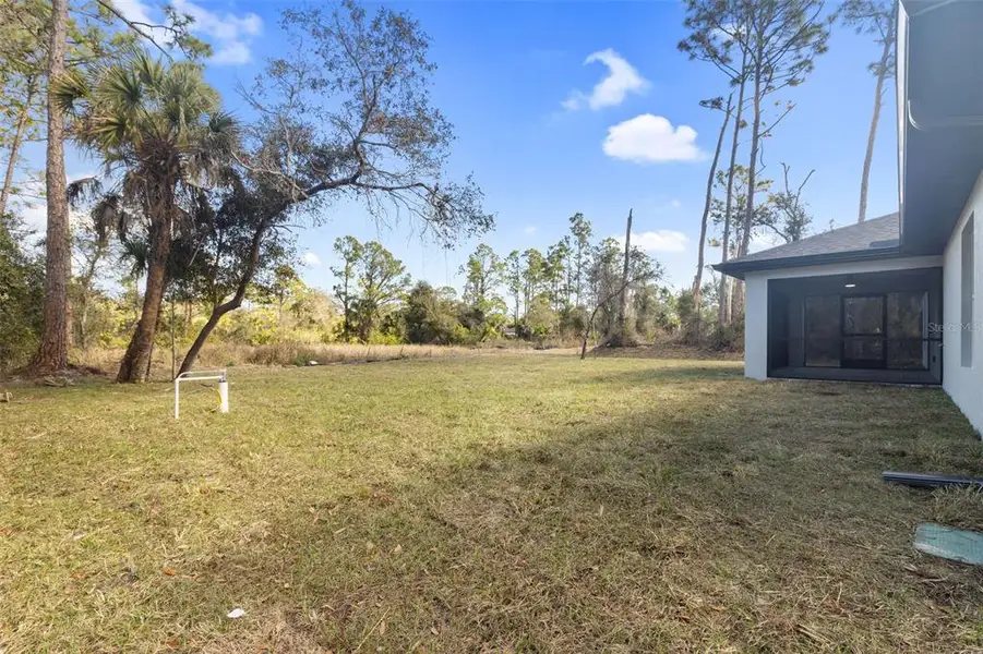 Exterior details and patio area of a home in , North Port (Image 3).