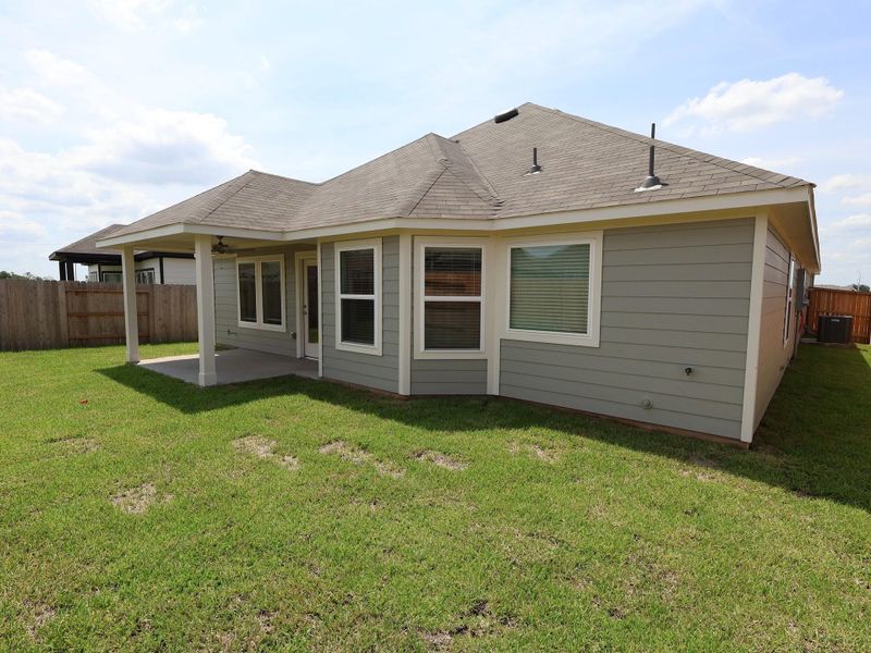 Front exterior of a new home in Summerview, Fulshear, TX, highlighting curb appeal (Image 9). Front exterior of a new home in Summerview, Fulshear, TX, highlighting curb appeal (Image 9).