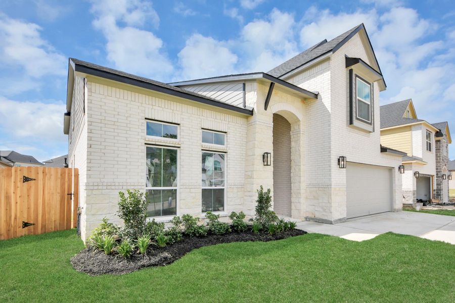 Home features a convenient 2-car garage complemented by a spacious driveway, offering ample parking for you and your guests. Home features a convenient 2-car garage complemented by a spacious driveway, offering ample parking for you and your guests.