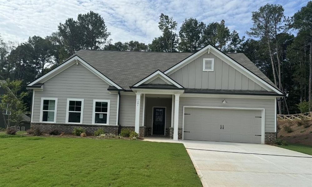Front exterior of a new home in , Winder, GA, highlighting curb appeal (Image 1). Front exterior of a new home in , Winder, GA, highlighting curb appeal (Image 1).