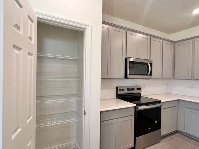 Furnished interior view inside a new home in Lakes At St Sebastian, Micco (Image 8).