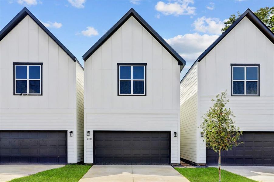 Each home has 2 car garage, long double wide driveway and sprinklers front and back.