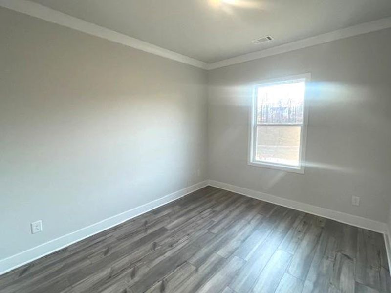 Spacious, unfurnished interior of a new home in Ponderosa Farms Estates, Gainesville (Image 34).