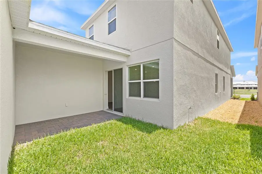 Exterior details and patio area of a home in Osprey Ranch, Winter Garden (Image 25).