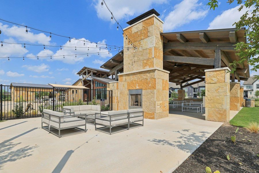 Community outdoor living space with a fireplace Community outdoor living space with a fireplace