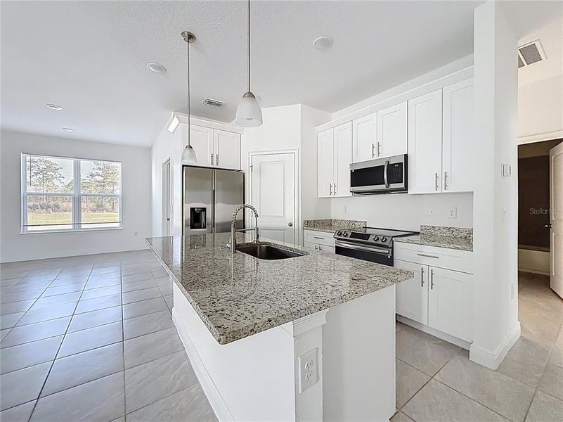 Furnished interior view inside a new home in , Ocala (Image 7).