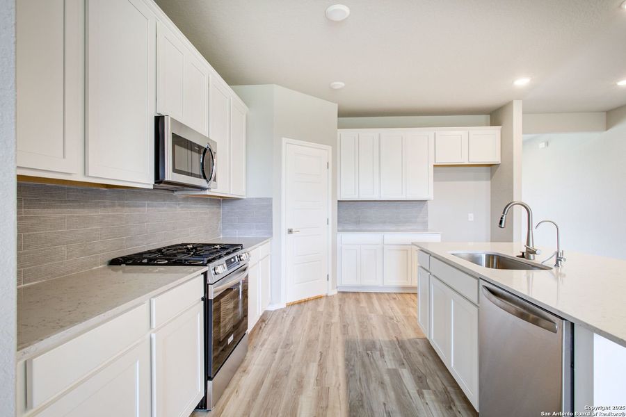 Furnished interior view inside a new home in Hickory Ridge, San Antonio (Image 50).