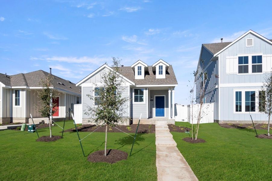 Front exterior of a new home in Harvest Ridge, Elgin, TX, highlighting curb appeal (Image 1).