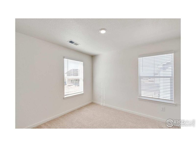Spacious, unfurnished interior of a new home in Prairie Song, Windsor (Image 17).