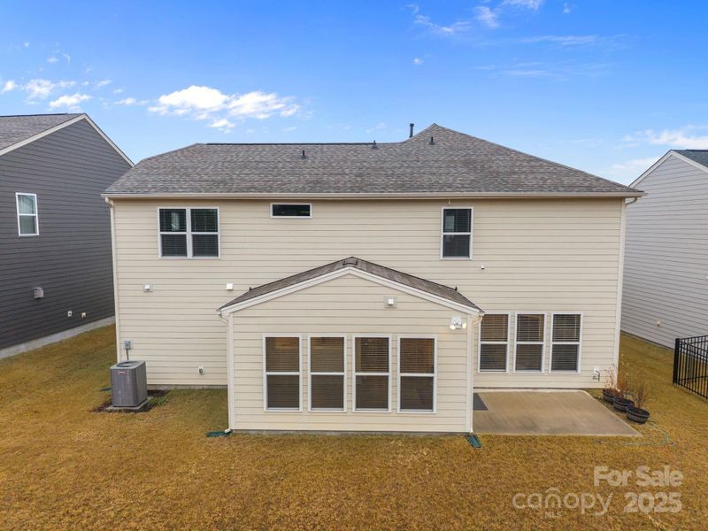Exterior details and patio area of a home in Parkside Crossing, Charlotte (Image 26). Exterior details and patio area of a home in Parkside Crossing, Charlotte (Image 26).