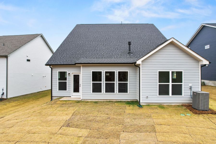 Exterior details and patio area of a home in Forest Creek, Waxhaw (Image 4).