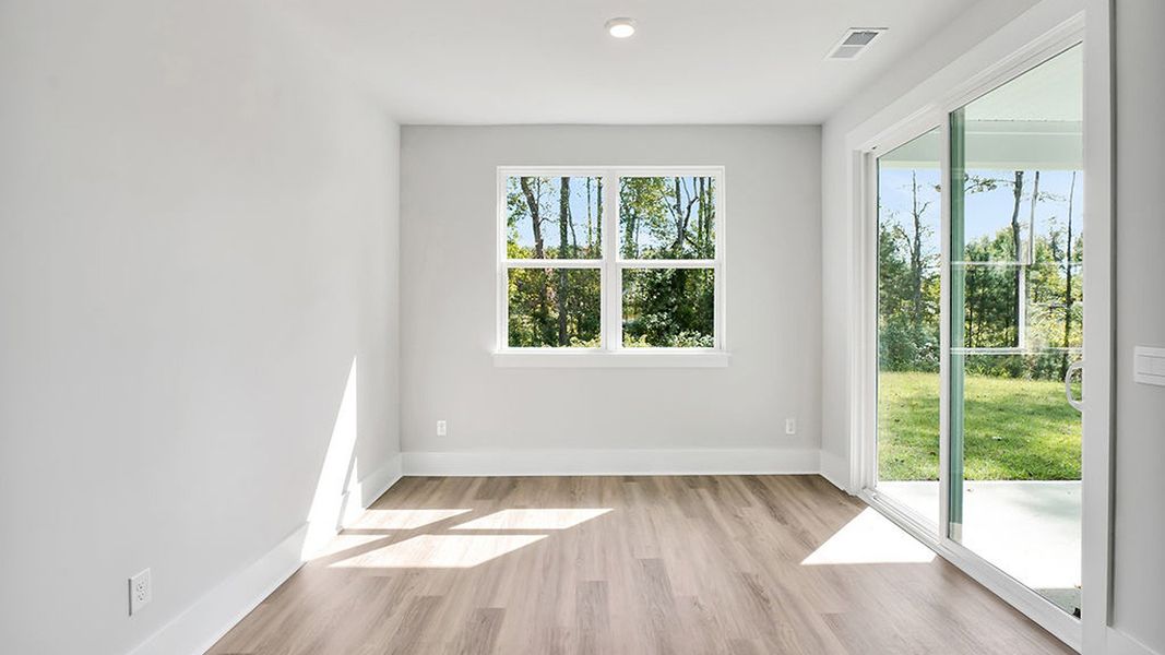 Representative unfurnished interior of a home built from the BRADFORD by D.R. Horton in Indigo Preserve, Leland (Image 24).