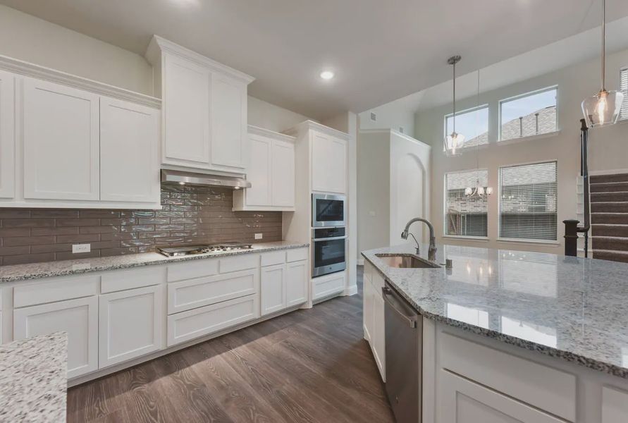 Representative furnished interior of a home built from the Pershing by Chesmar Homes in Trinity Falls, McKinney (Image 3).
