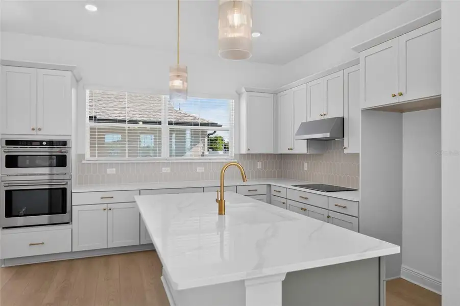 Furnished interior view inside a new home in Lake Cawood Cove, Windermere (Image 7).