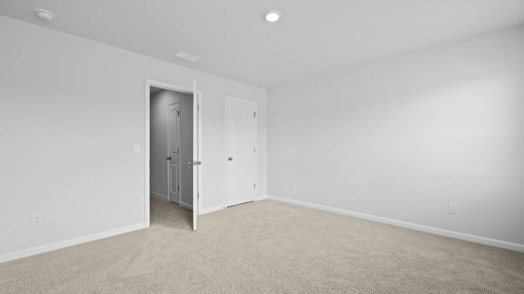 Spacious, unfurnished interior of a new home in Pine Hills Townhomes at Cane Bay, Summerville (Image 30).