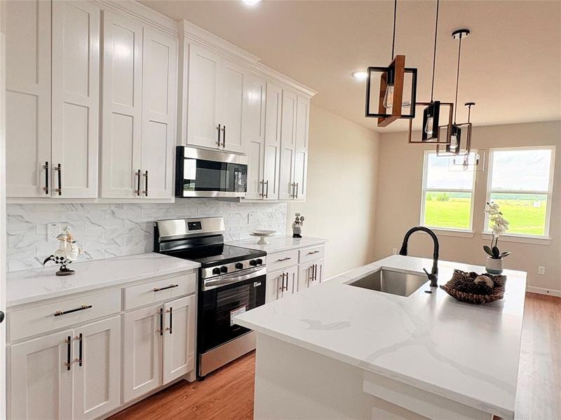 Furnished interior view inside a new home in , Quinlan (Image 9).