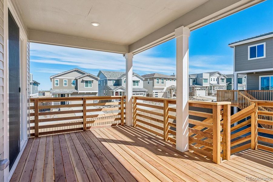 Exterior details and patio area of a home in The Summit at Meridian, Englewood (Image 3).