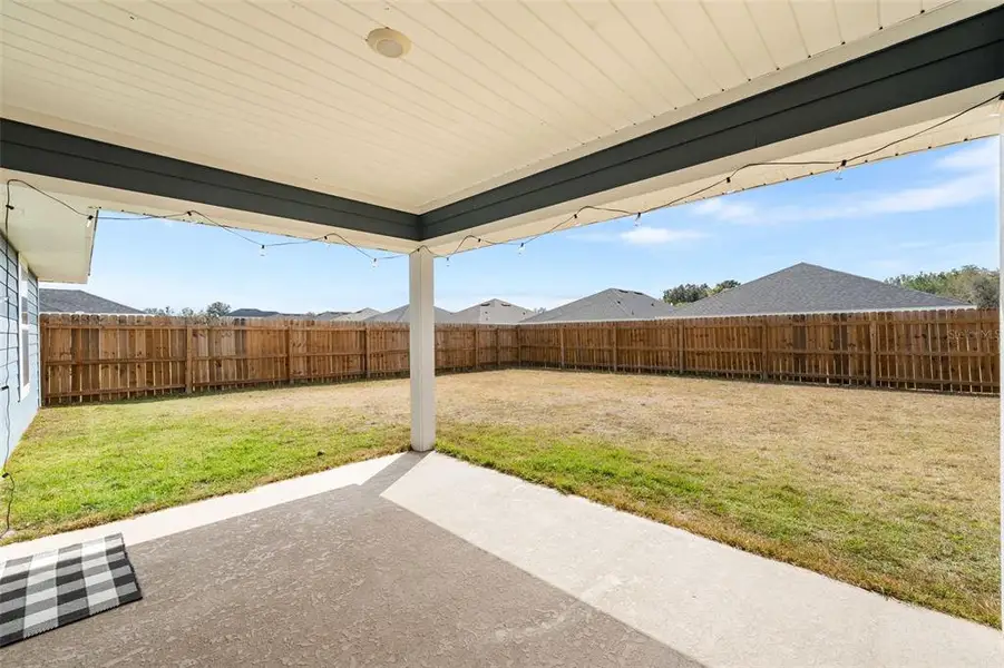 Exterior details and patio area of a home in Country Way South, Newberry (Image 4).