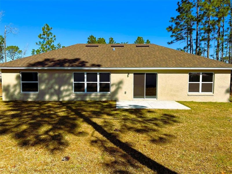 Exterior details and patio area of a home in , Citrus Springs (Image 15).