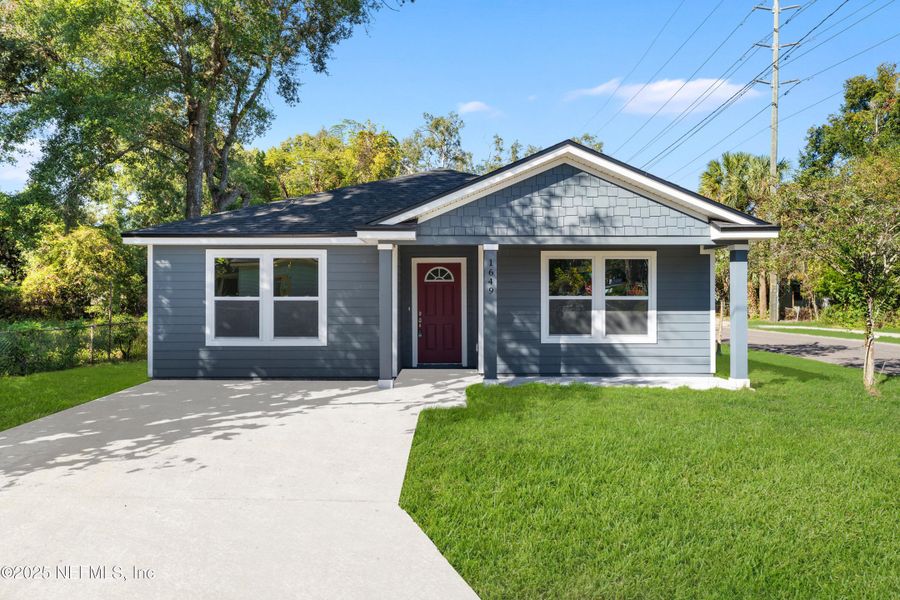 Front exterior of a new home in , Jacksonville, FL, highlighting curb appeal (Image 1). Front exterior of a new home in , Jacksonville, FL, highlighting curb appeal (Image 1).