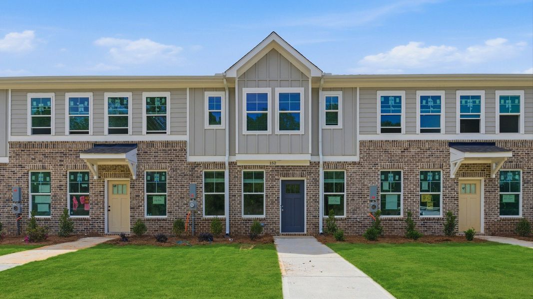 Front exterior of a new home in Avery Landing, McDonough, GA, highlighting curb appeal (Image 20).